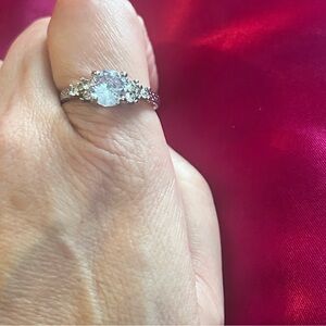 Sterling Silver and Cubit Zirconia Trilogy Ring Size 10 1/2.